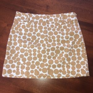 Crew Cream mini skirt w/ brown circular pattern with belt loops …
